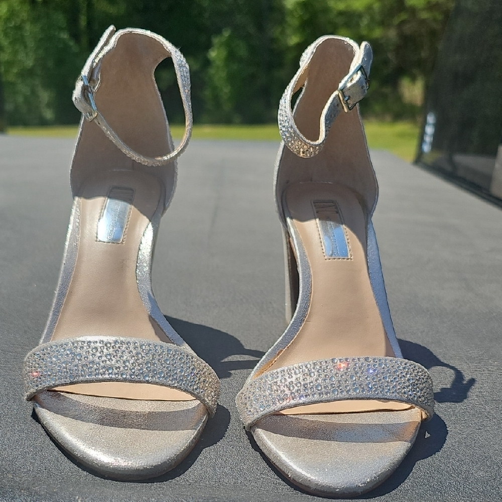 Glamorous Silver Stiletto Heels with Rhinestone Embellishments